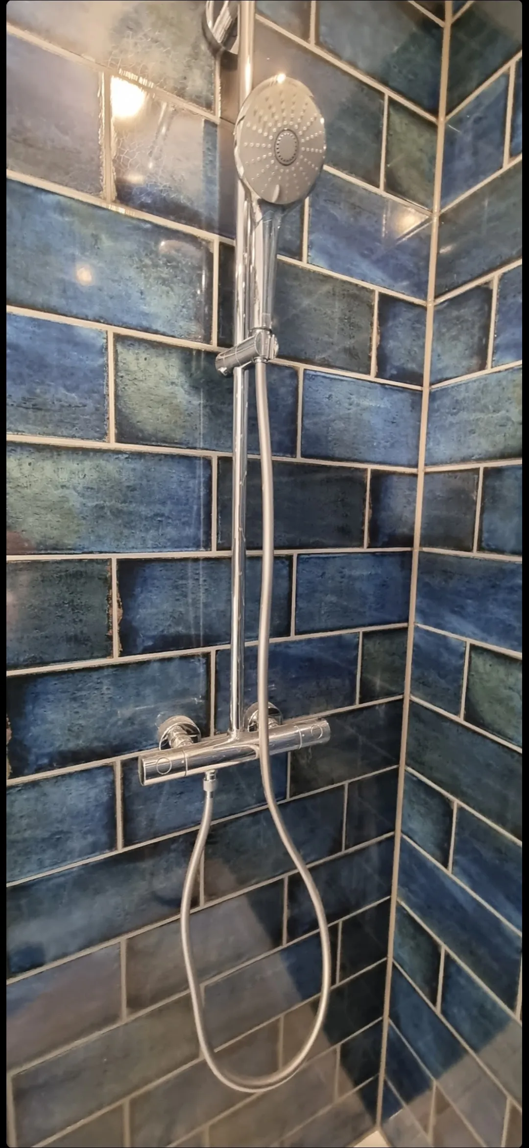 Bathroom blue metro tile WC installation in progress — bathroom fitters Surrey