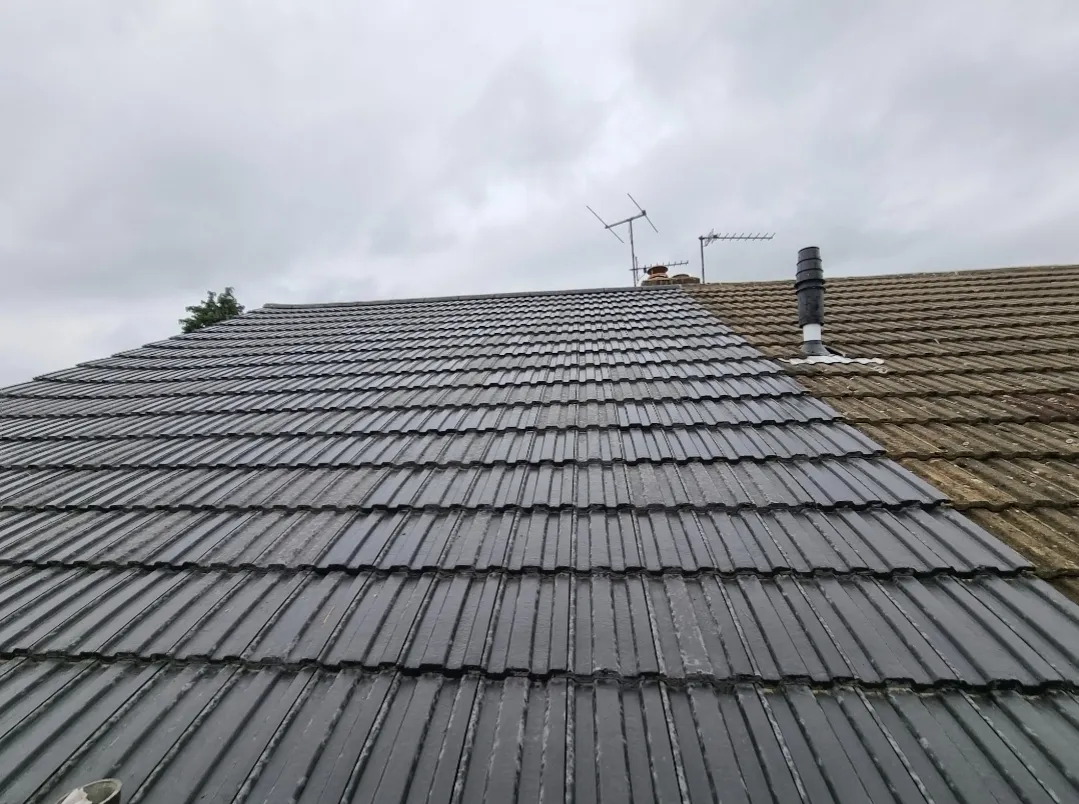 Grey tile roof new versus old partial replacement — roofing contractors Surrey