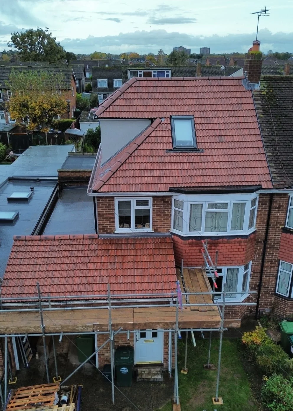 Pitched roof replacement with dormer and Velux, scaffolding — Hampton SW London